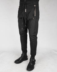 Contrasting woven jersey trousers black